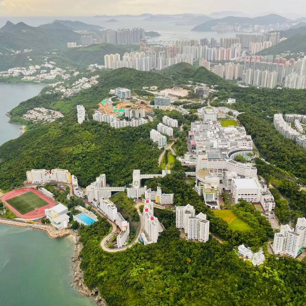 Helicopter flies over HKUST campus at Clear Water Bay.