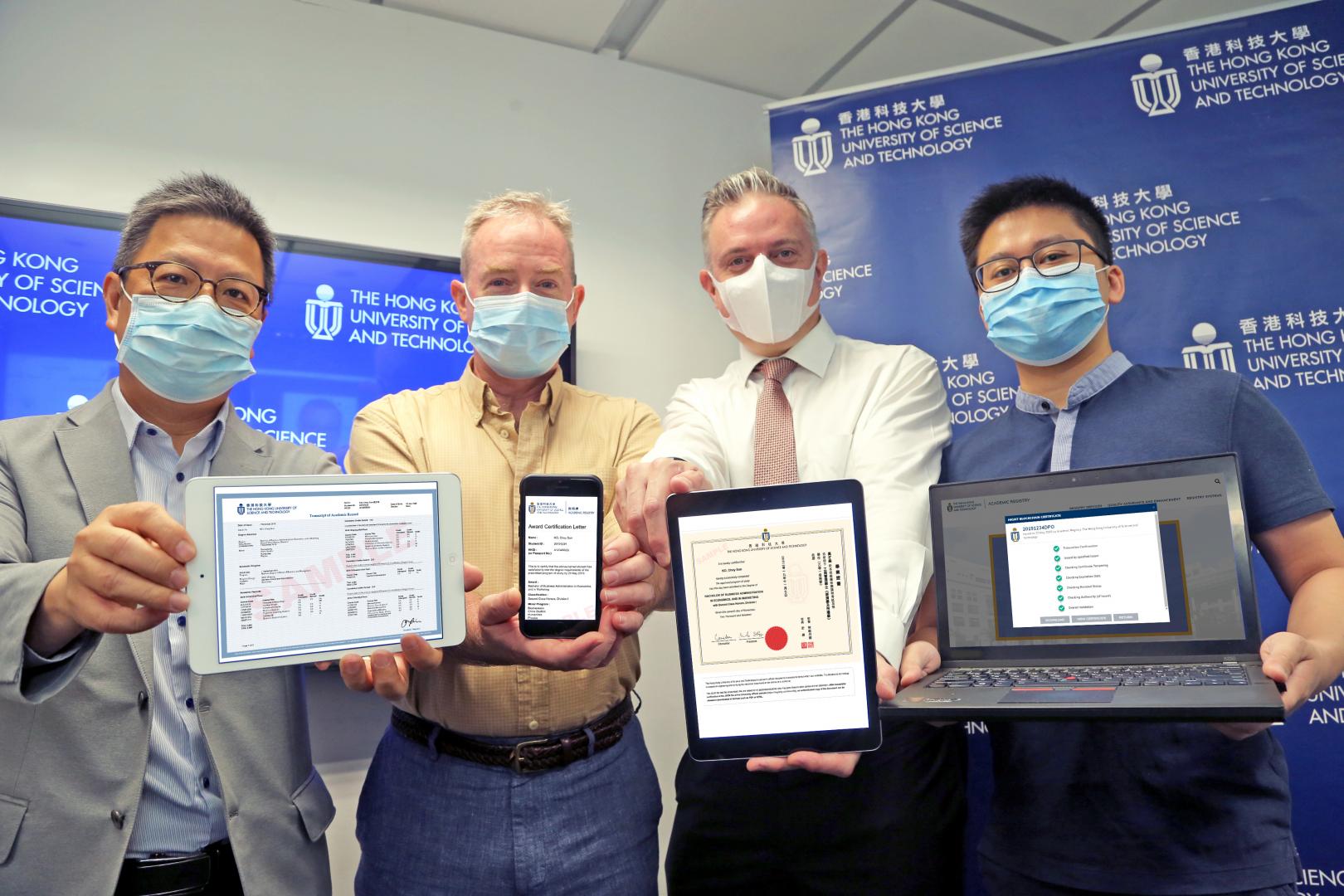 (From right) Prof. CHEN Qifeng, Assistant Professor of the Department of Computer Science and Engineering at HKUST; Mr. James PRINCE, Academic Registrar, HKUST; Mr. Davis BOOKHART, Senior Manager and Head, HKUST Sustainability Unit; and Prof. LO Hong-Kam, Director of HKUST’s GREAT Smart Cities Institute demonstrate how different HKUST documents can be verified using different devices