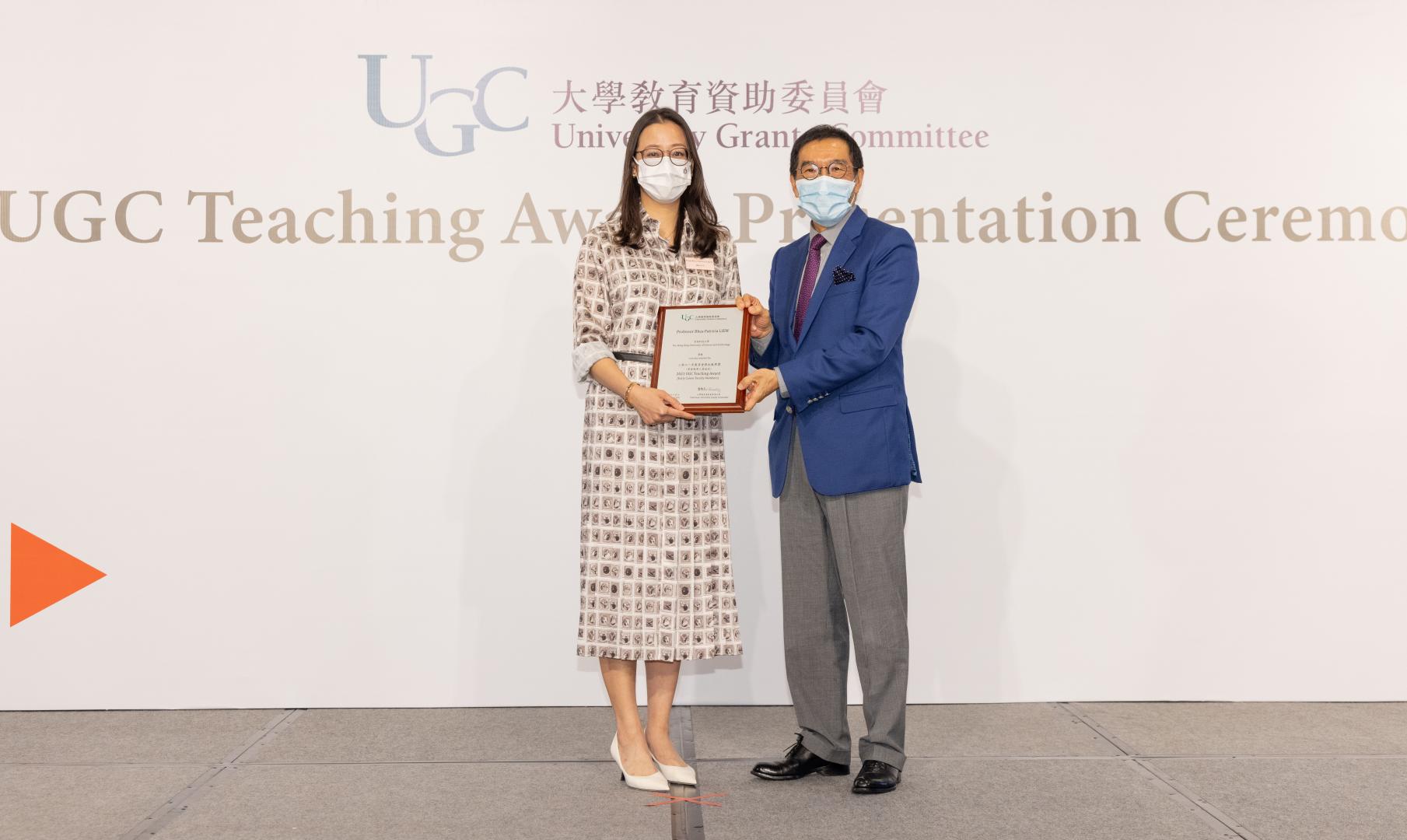 Prof. Liem winning the UGC Award